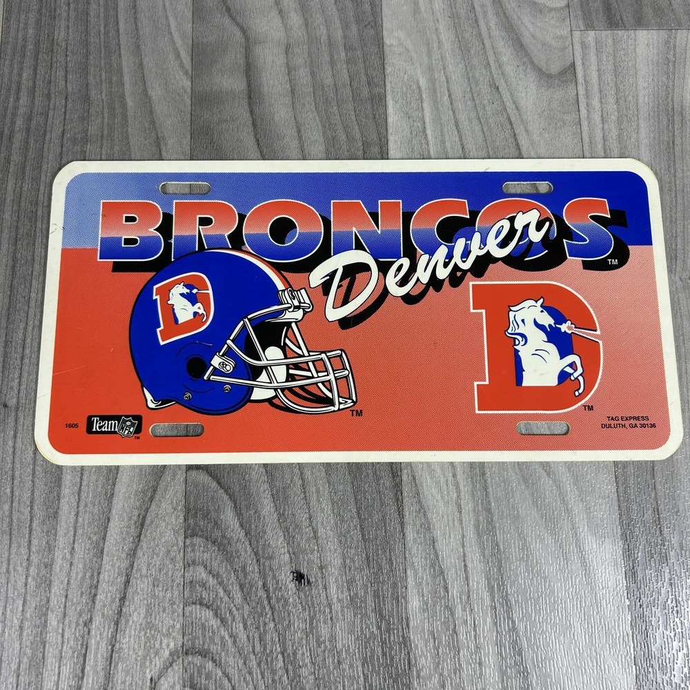 Vintage Denver Broncos NFL License Plate Tag Express Orange Blue Helmet Logo